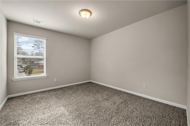 unfurnished room with carpet