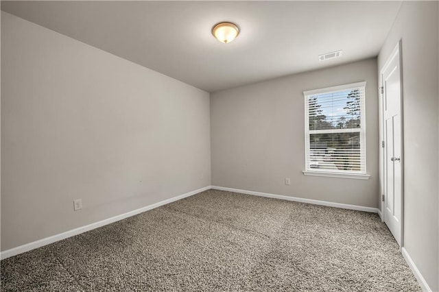 unfurnished room featuring carpet floors