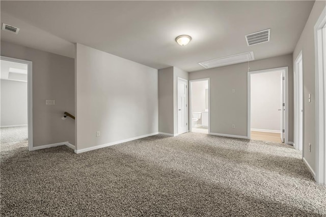 spare room featuring carpet