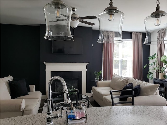 living room featuring ceiling fan