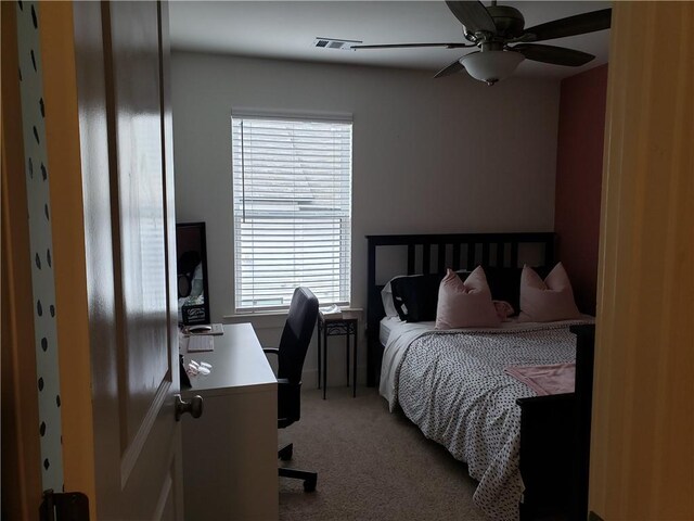 bedroom featuring carpet floors and ceiling fan