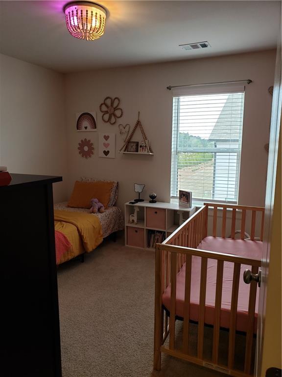 bedroom featuring carpet floors