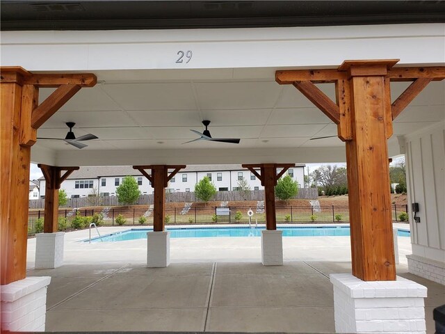 view of pool with ceiling fan