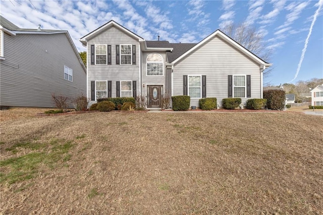 view of front property with a front lawn