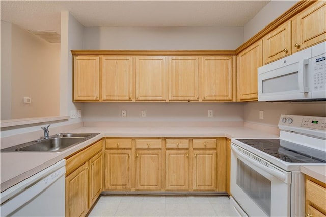 124 Camry Ln, Grayson, GA 30017 - kitchen featuring white appliances, a sink, light countertops, light tile patterned floors, and light brown cabinets