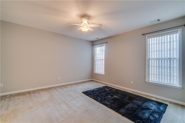 124 Camry Ln, Grayson, GA 30017 - carpeted empty room with ceiling fan and baseboards