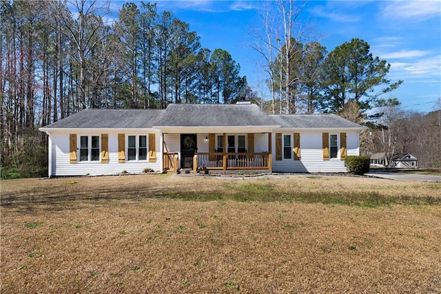 single story home with a porch and a front lawn