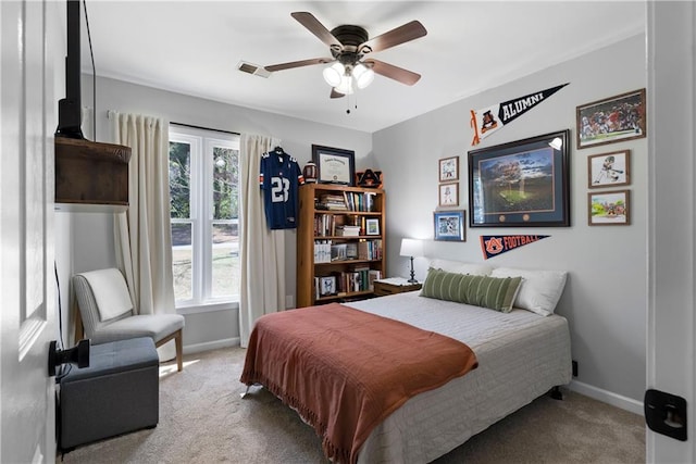 bedroom with visible vents, carpet floors, and baseboards