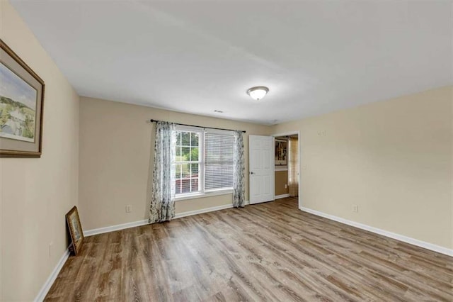 1141 Planing Mill Rd, Greensboro, GA 30642 - spare room with wood finished floors and baseboards