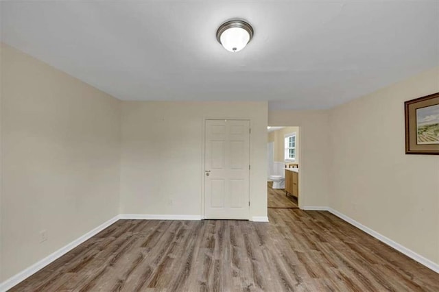 1141 Planing Mill Rd, Greensboro, GA 30642 - unfurnished room featuring wood finished floors and baseboards