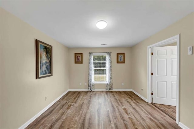1141 Planing Mill Rd, Greensboro, GA 30642 - spare room featuring wood finished floors and baseboards