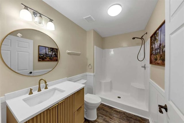 1141 Planing Mill Rd, Greensboro, GA 30642 - full bath featuring wood finished floors, a shower, toilet, and vanity