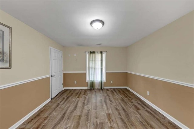 1141 Planing Mill Rd, Greensboro, GA 30642 - empty room featuring wood finished floors and baseboards