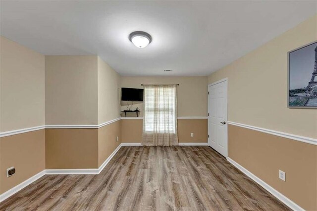 1141 Planing Mill Rd, Greensboro, GA 30642 - spare room with wood finished floors and baseboards