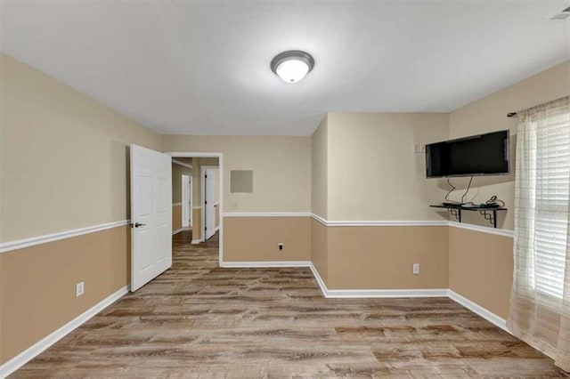 1141 Planing Mill Rd, Greensboro, GA 30642 - spare room with wood finished floors and baseboards