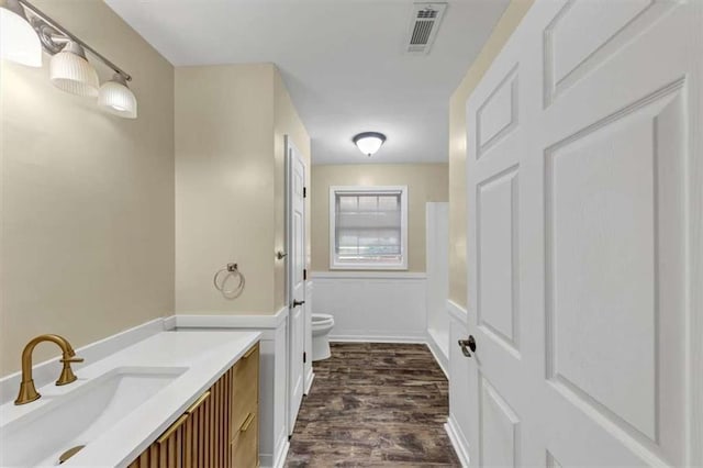 1141 Planing Mill Rd, Greensboro, GA 30642 - full bath featuring toilet, wood finished floors, and vanity
