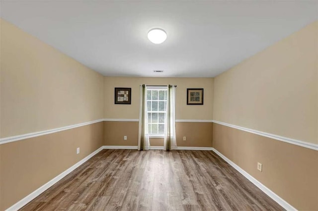 1141 Planing Mill Rd, Greensboro, GA 30642 - spare room featuring wood finished floors and baseboards