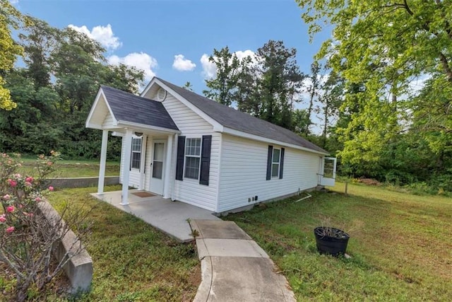 1141 Planing Mill Rd, Greensboro, GA 30642 - view of side of home featuring a lawn