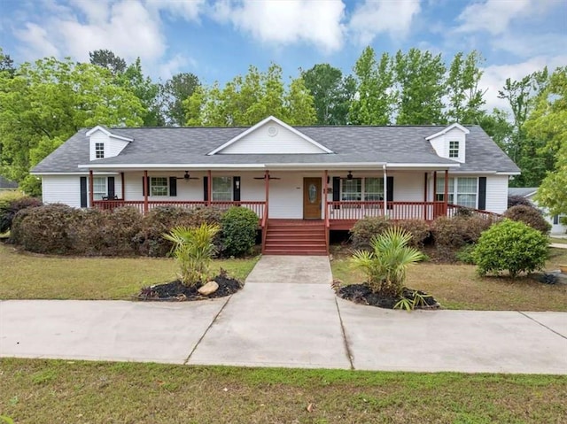 1141 Planing Mill Rd, Greensboro, GA 30642 - view of front of house with a porch, a ceiling fan, and a front lawn
