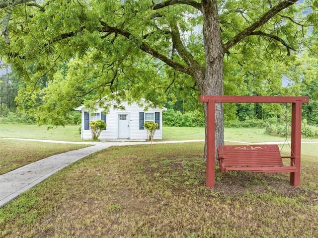 1141 Planing Mill Rd, Greensboro, GA 30642 - view of grassy yard with an outdoor structure