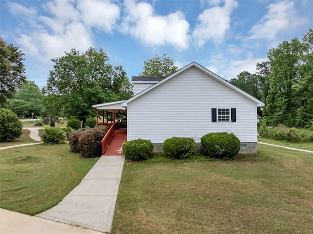 1141 Planing Mill Rd, Greensboro, GA 30642 - view of side of home with a yard and crawl space