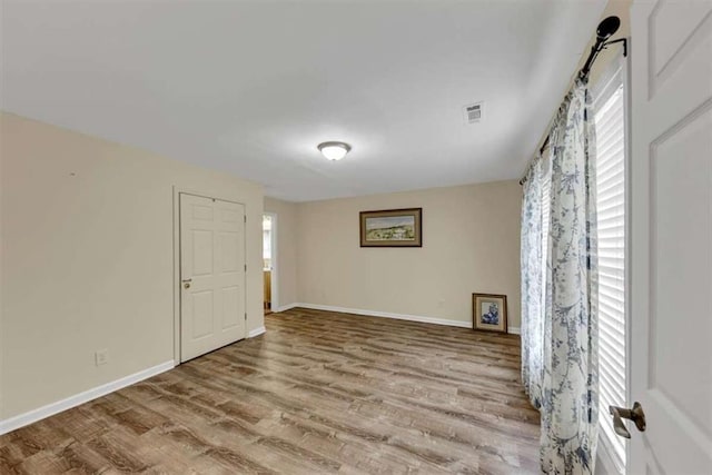 1141 Planing Mill Rd, Greensboro, GA 30642 - spare room featuring wood finished floors and baseboards