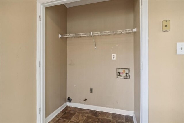 laundry area with gas dryer hookup, washer hookup, and hookup for an electric dryer