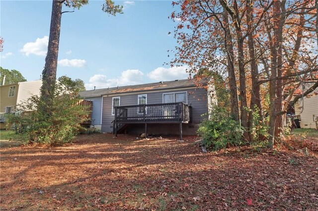 rear view of property with a deck