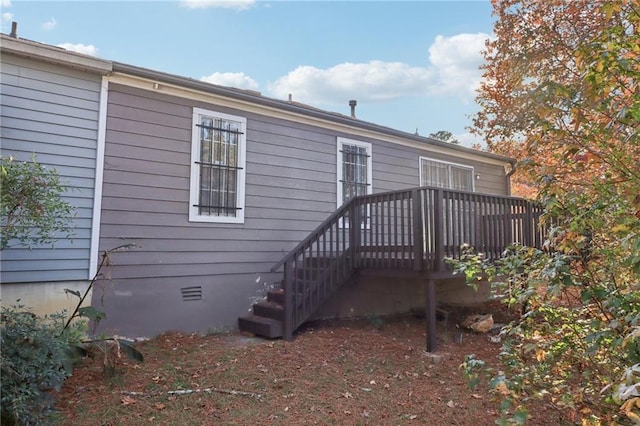 rear view of house with a deck