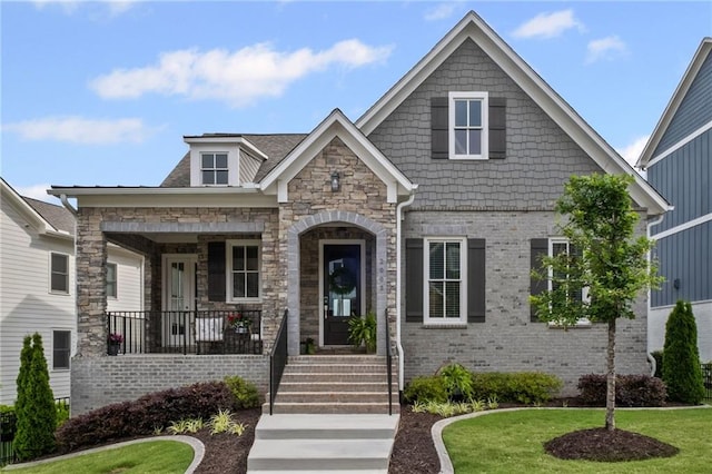 2003 Haley Walk, Woodstock, GA 30188 - craftsman-style home with a porch, stone siding, and a front yard