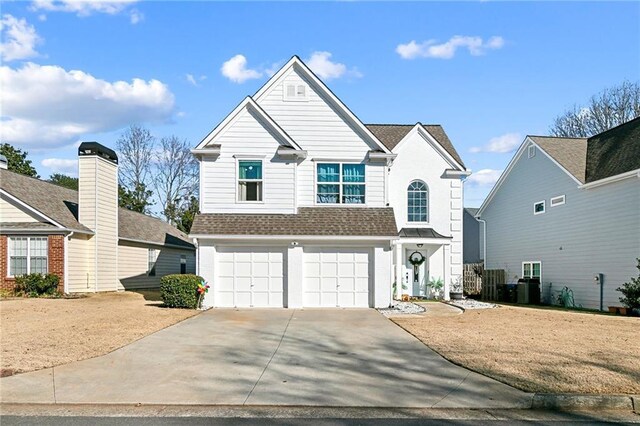 front facade with a garage