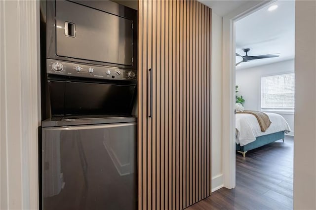 4282 Roswell Rd NE Unit G1, Atlanta, GA 30342 - laundry area featuring stacked washer / drying machine, dark wood-style floors, and baseboards