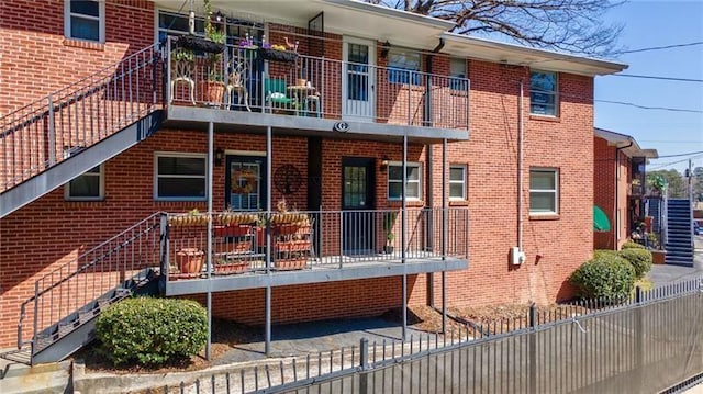 4282 Roswell Rd NE Unit G1, Atlanta, GA 30342 - rear view of property featuring brick siding