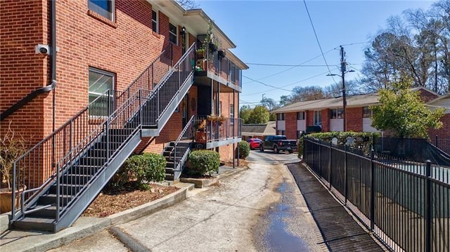4282 Roswell Rd NE Unit G1, Atlanta, GA 30342 - view of property featuring driveway and stairs