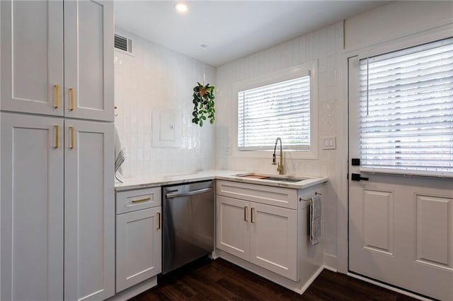 4282 Roswell Rd NE Unit G1, Atlanta, GA 30342 - kitchen with dishwasher, a sink, dark wood-style flooring, and light stone countertops