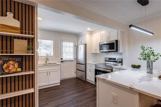4282 Roswell Rd NE Unit G1, Atlanta, GA 30342 - kitchen with appliances with stainless steel finishes, a sink, light stone counters, dark wood-type flooring, and white cabinets