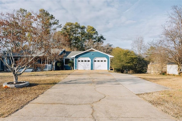 single story home featuring a garage