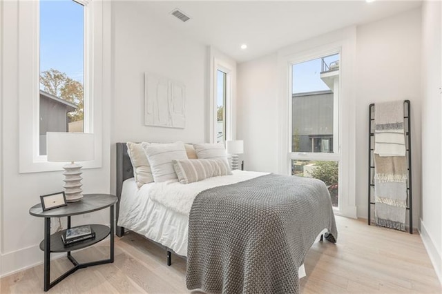 bedroom featuring light wood-type flooring