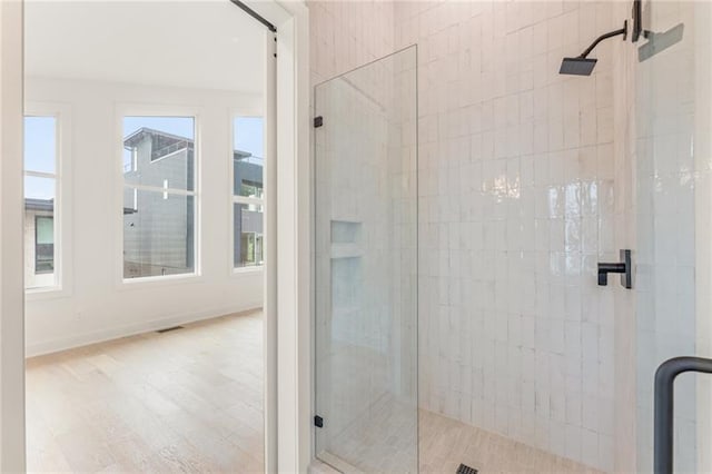 bathroom with an enclosed shower