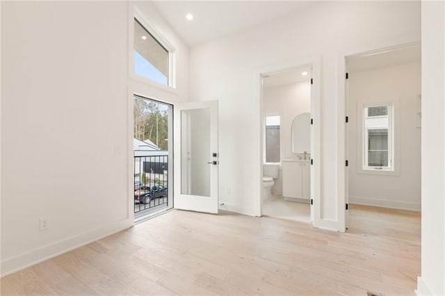 interior space featuring french doors and light hardwood / wood-style flooring