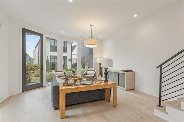 living room with light hardwood / wood-style floors