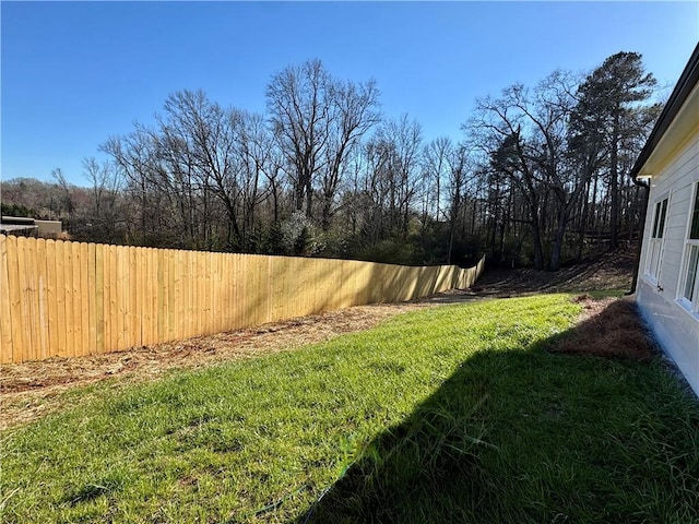 view of yard featuring fence