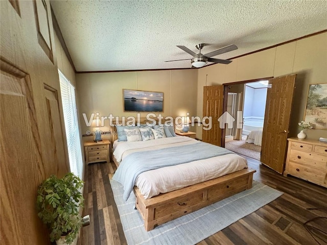 bedroom featuring dark hardwood / wood-style flooring, ornamental molding, a textured ceiling, vaulted ceiling, and ceiling fan