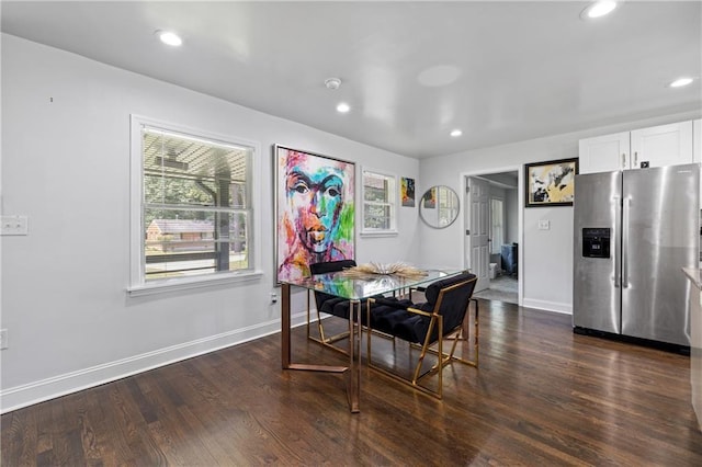 dining room with dark hardwood / wood-style floors