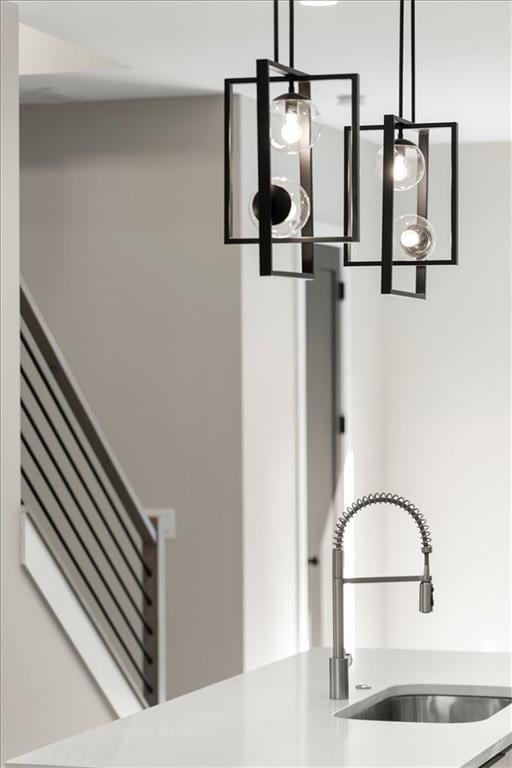 details with hanging light fixtures and sink