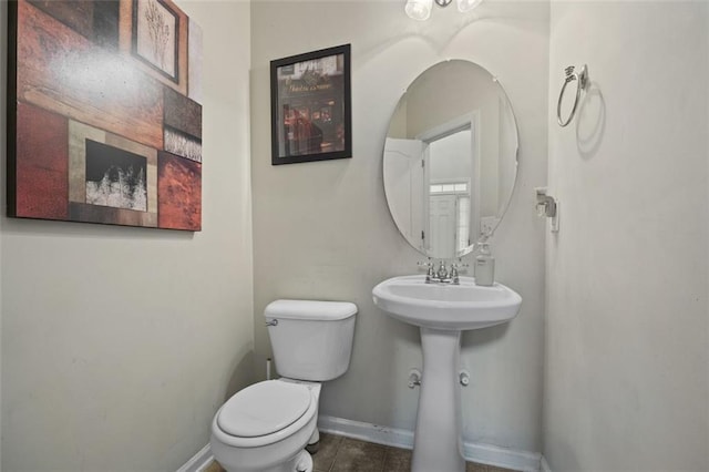 83 Leyland Xing, Dallas, GA 30132 - bathroom with toilet, baseboards, and tile patterned floors