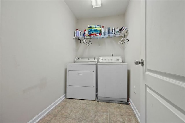 83 Leyland Xing, Dallas, GA 30132 - laundry area with washing machine and dryer, baseboards, and light tile patterned floors