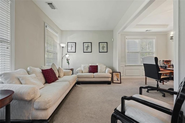 83 Leyland Xing, Dallas, GA 30132 - living room featuring carpet floors, healthy amount of natural light, an office area, a wainscoted wall, and a decorative wall