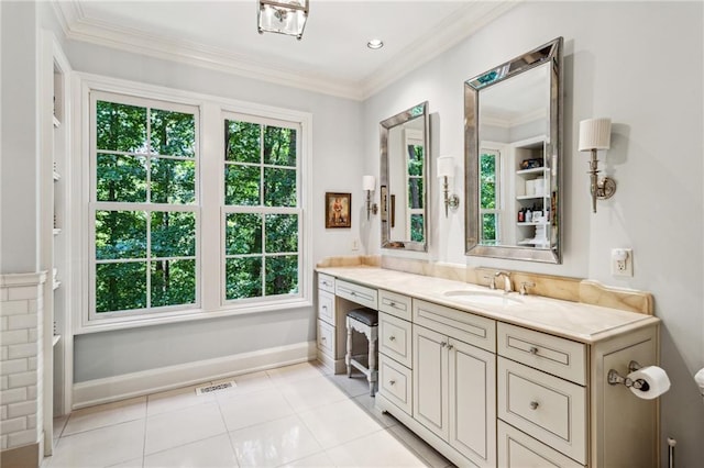 bathroom featuring tile patterned flooring, visible vents, baseboards, ornamental molding, and vanity