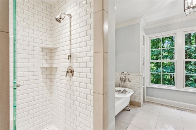 full bathroom with a freestanding bath, ornamental molding, a stall shower, tile patterned floors, and tile walls